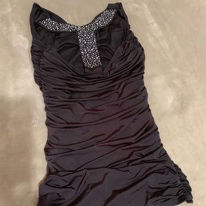 Black dress. Beaded back . Size m